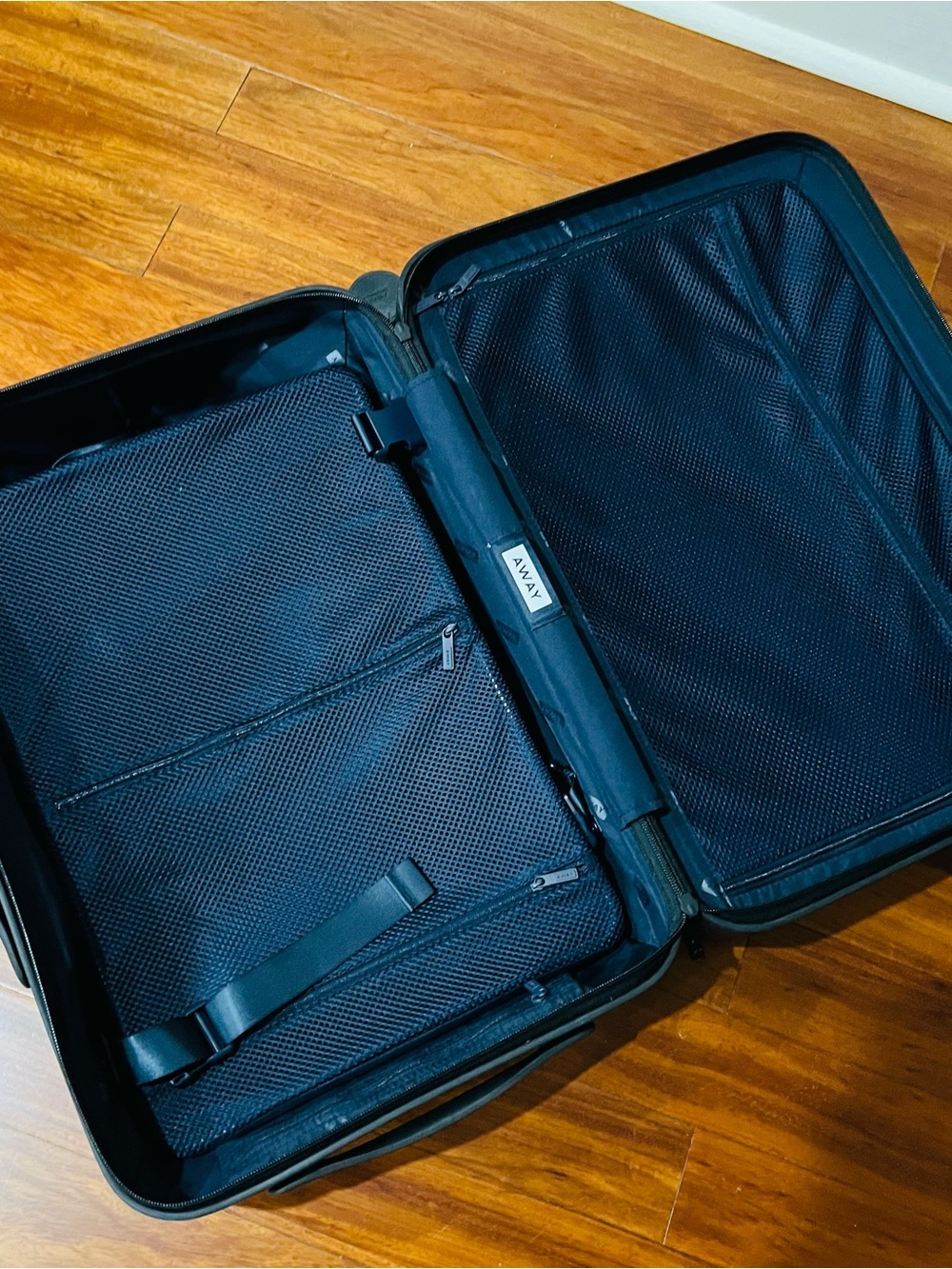 Away carry on blue hardshell luggage in good condition, only used a few times.